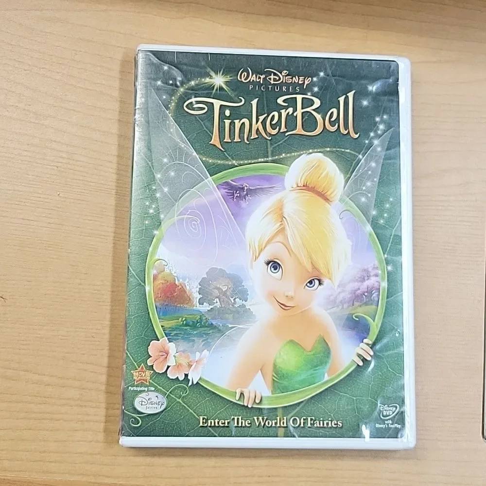 Walt Disney Tinkerbell bundle frame puzzle, dvd, book, kaleidoscope, pez, bag